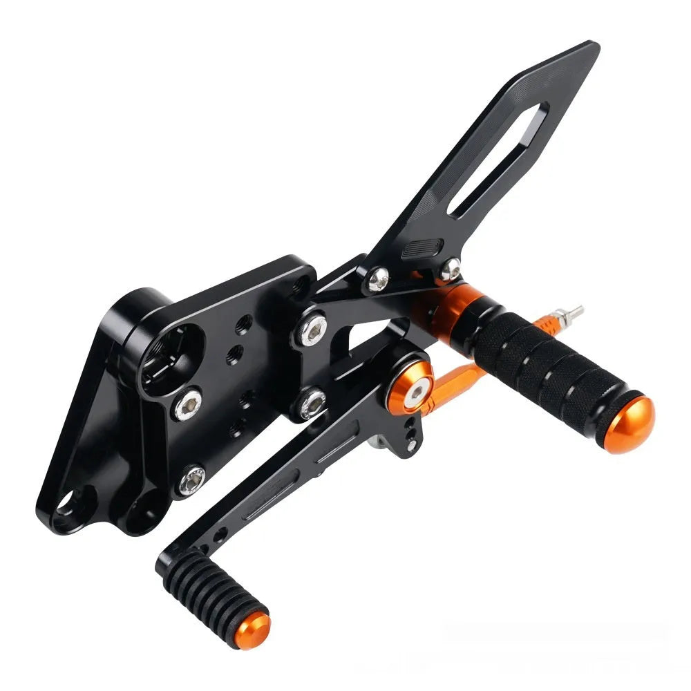 KTM DUKE rear shift pedal support assembly kit in black and orange colours