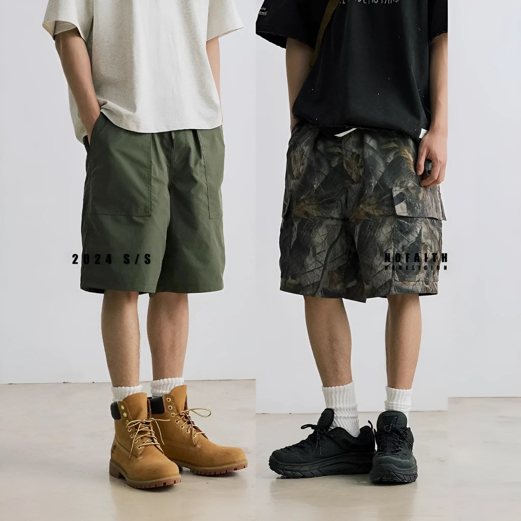 Men's loose fit denim shorts in army green with an elasticated waistband and straight leg.