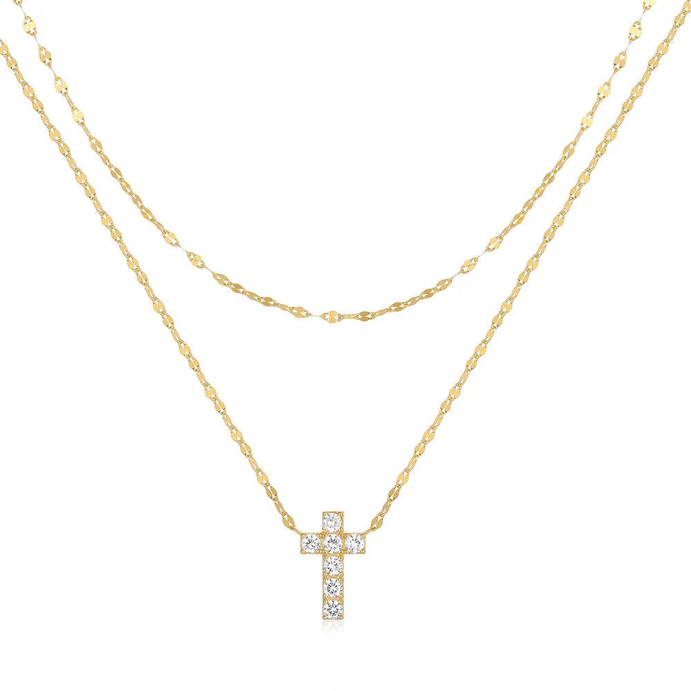 S925 sterling silver double layer cross pendant necklace with diamond cut detail on a clavicle chain.