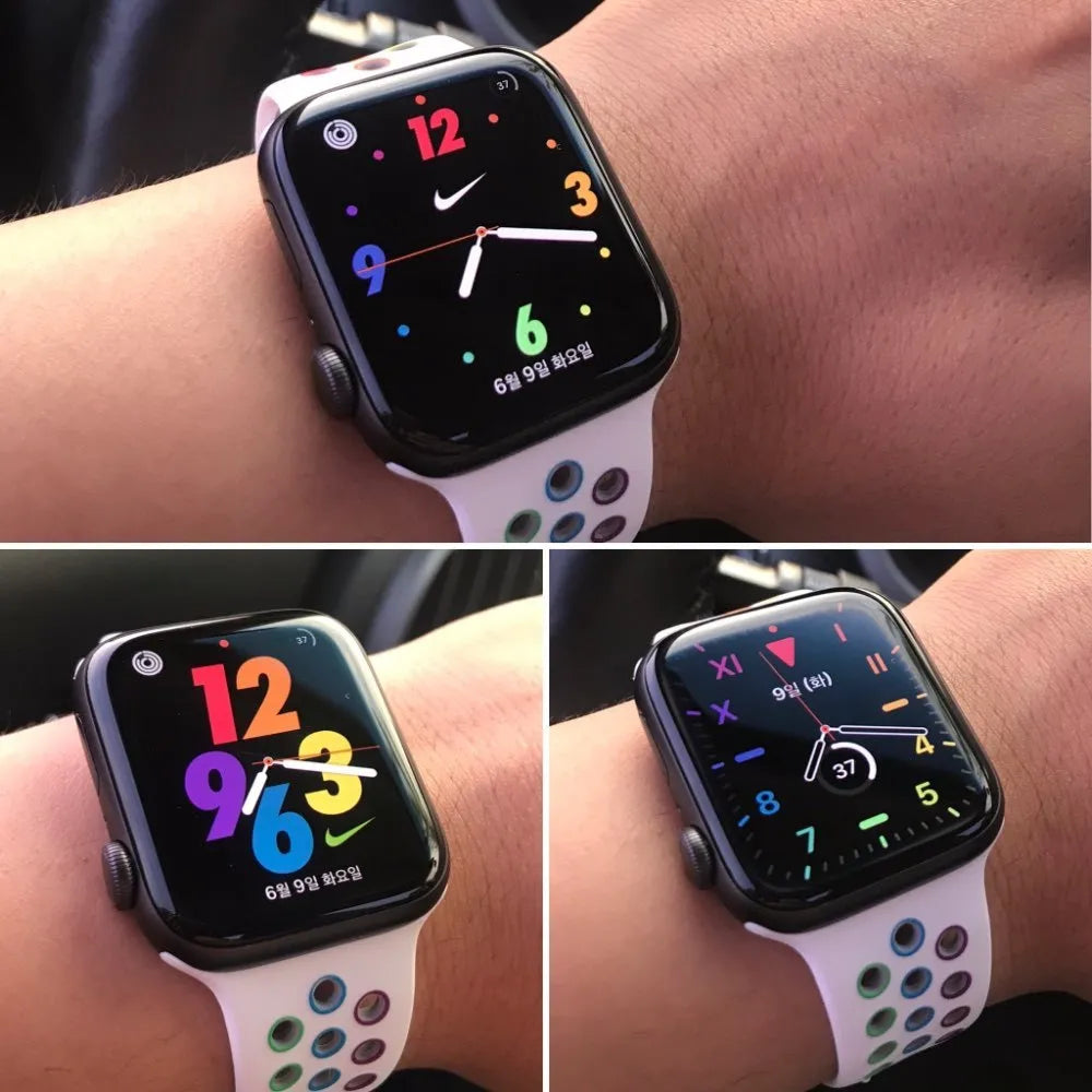 Silicone sports wristband with buckle strap in black, rainbow, or white colour options.