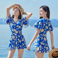 Women's high waist floral print one-piece swimsuit in blue pattern or white flower colours
