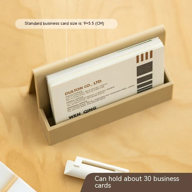 Creative business card storage display stand in geometric design, holds 20 cards, available in five colours