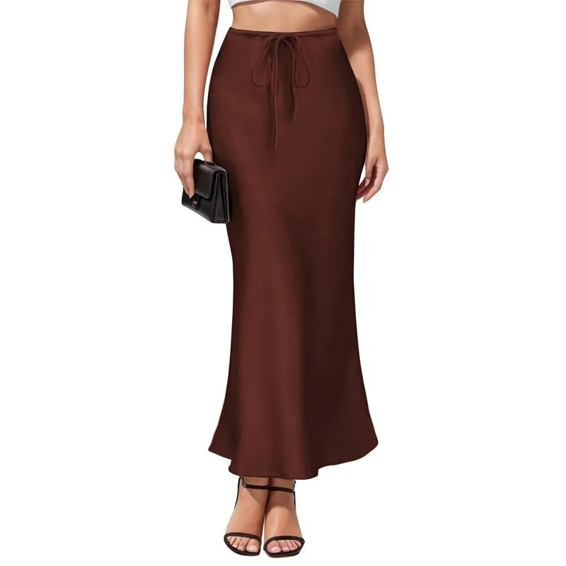 Asymmetric acetate satin skirt with irregular stitching details in high waist design