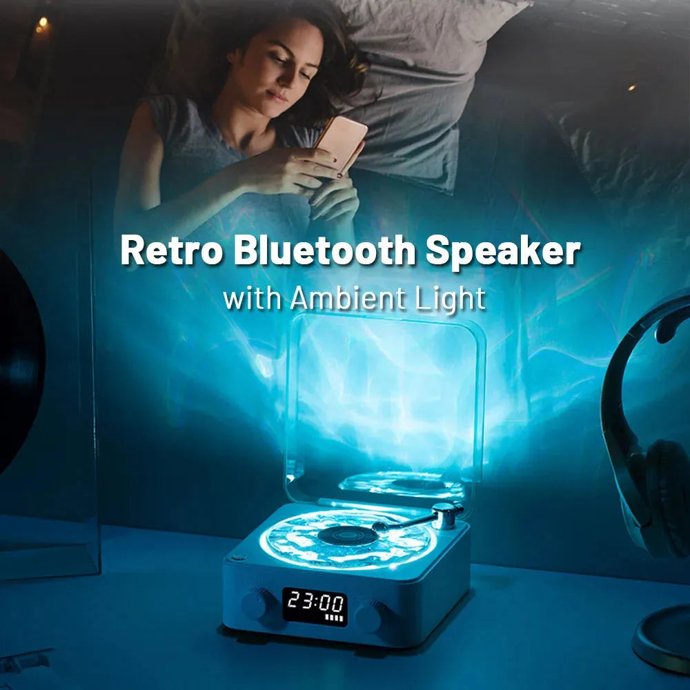Retro turntable Bluetooth speaker with rotating vinyl and RGB projection lighting effects