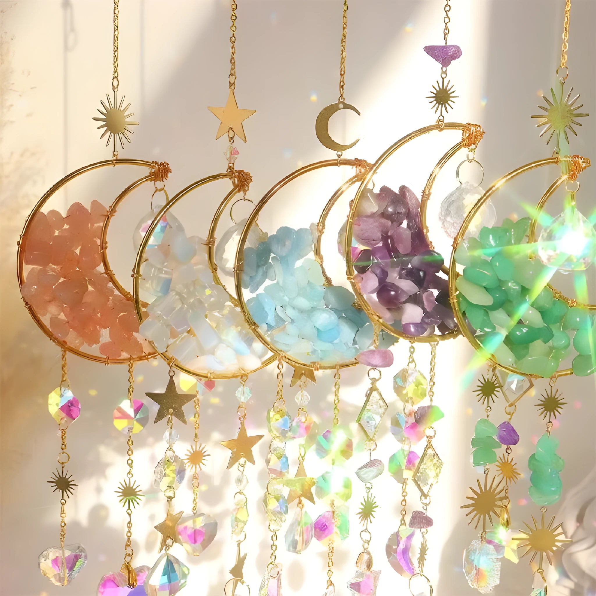 K9 crystal moon car pendant hanging on a metal chain, shown in a blue colour option.