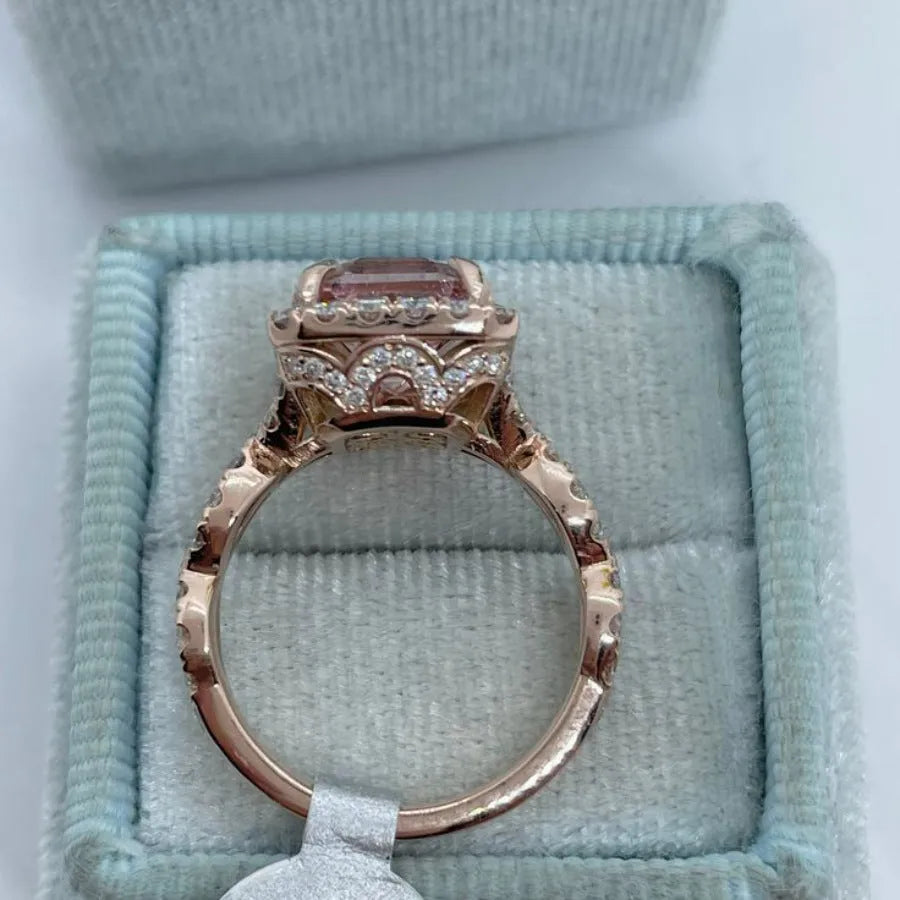Rose gold coloured geometric alloy ring showing electroplated finish and angular design details