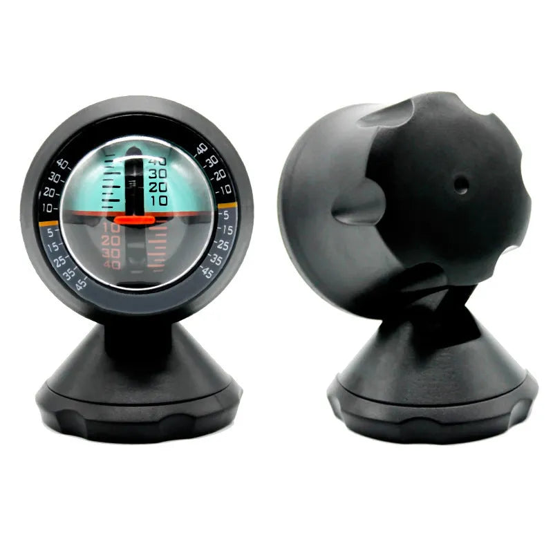 Black vehicle mounted slope meter for measuring car inclination and elevation angles on dashboard.