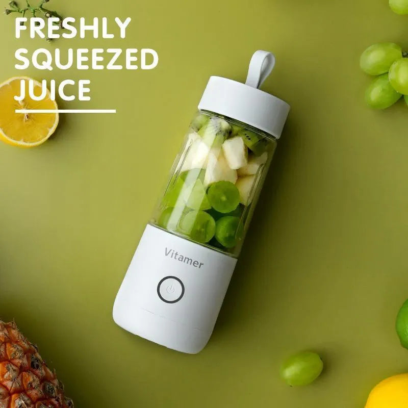 Dreamer Juice Cup portable blender in pink and white with 350ml capacity and stainless steel blade