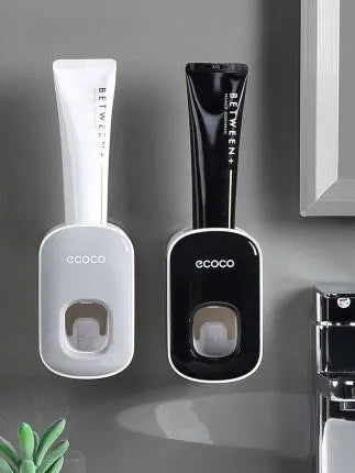 Wall mounted automatic toothpaste dispenser with toothbrush holder and mouthwash cup in black plastic