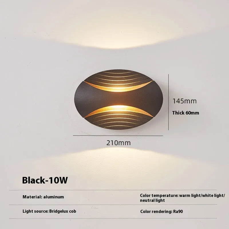 Modern minimalist aluminium wall lamp with IP65 rating, shown in black gold finish.