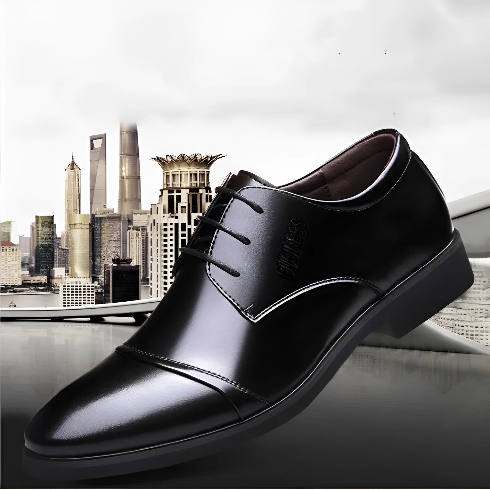 Men's black formal leather lace-up shoes with stitching detail and rubber sole