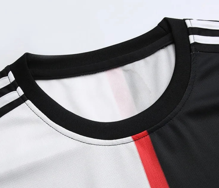 Men's football uniform in black and white cotton blend, one size front view