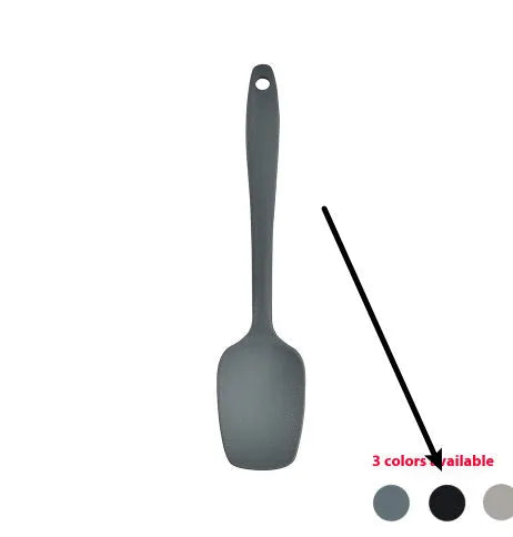 Silicone kitchen utensil set with twelve tools in a rotating white storage caddy on a counter.