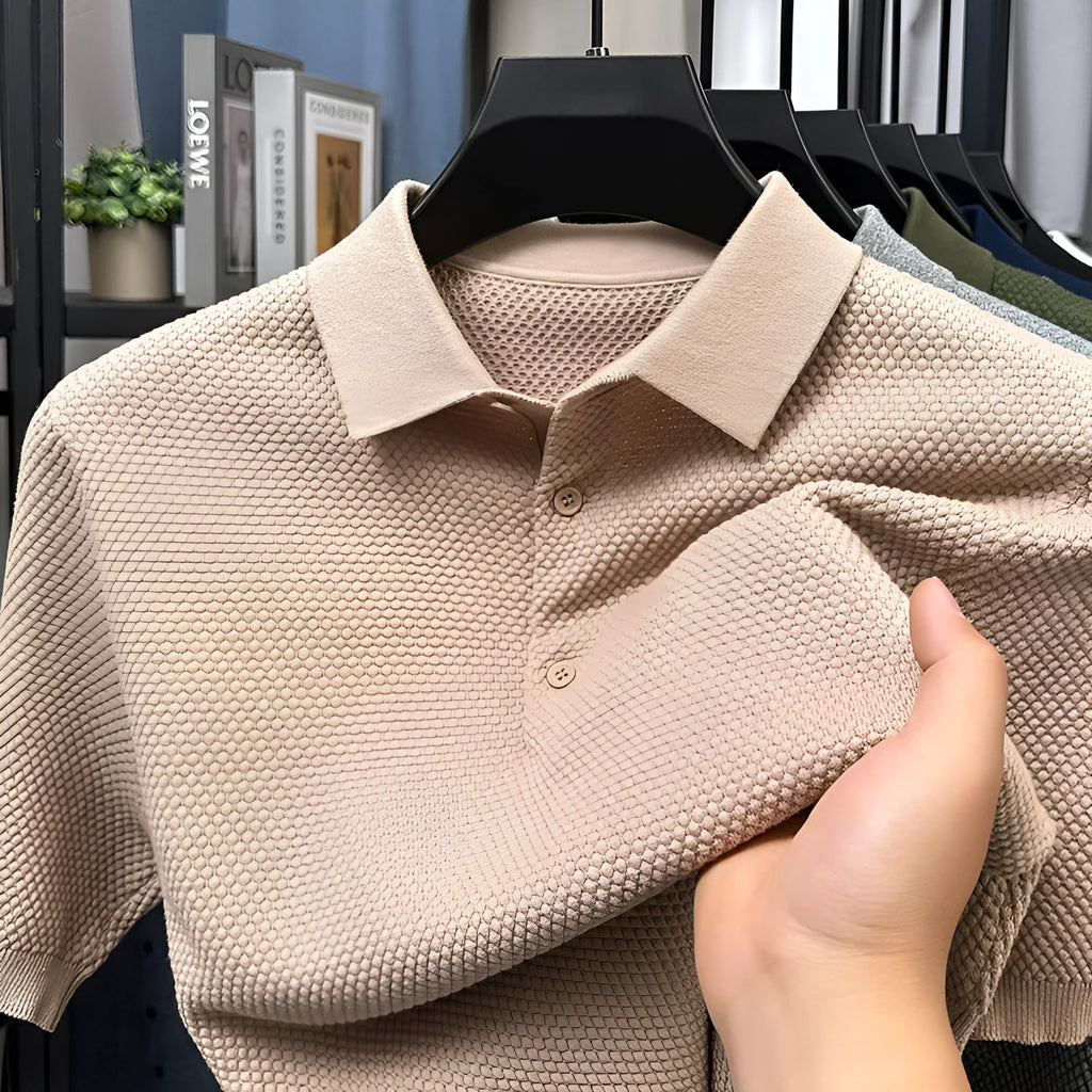 Men's loose grey short sleeve cotton sweater on a hanger