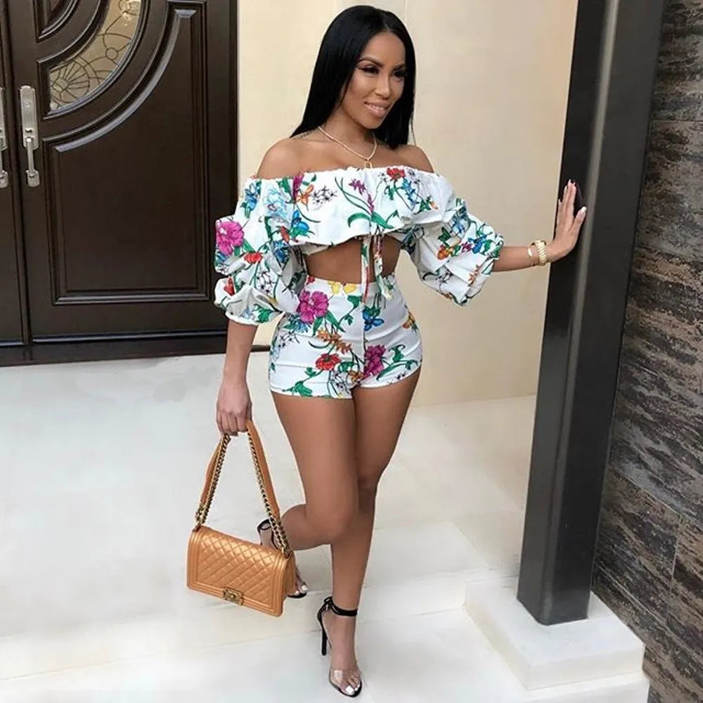 Women's multicolour digital print two-piece suit with a pile sleeve jacket and matching shorts.