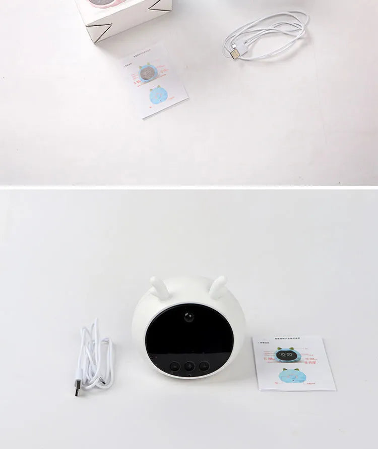Silicone smart alarm clock with voice control and human body induction, shown in a white deer style.