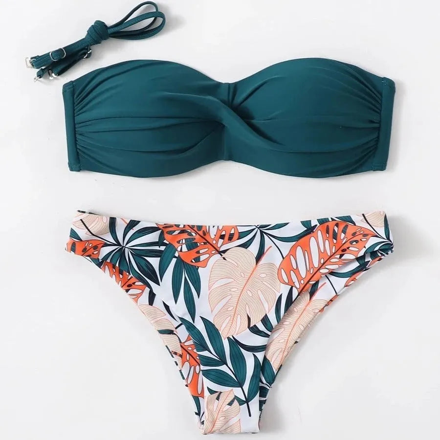 Green split push up bikini set with briefs bottom on a mannequin
