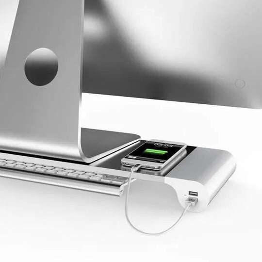 Aluminium computer monitor stand with 4 USB charging ports and keyboard storage space underneath