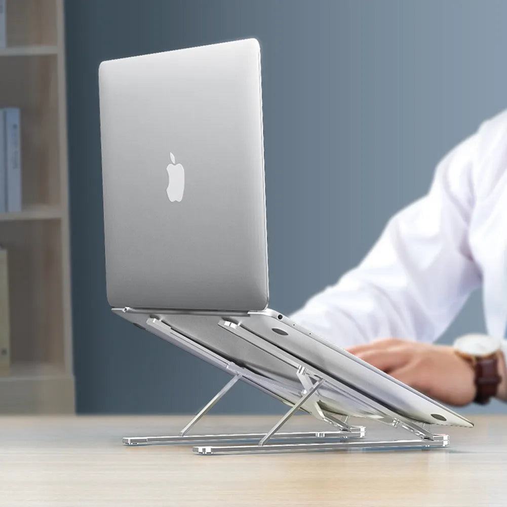 Aluminium foldable laptop stand shown in silver colour, adjusted to a mid-height position.
