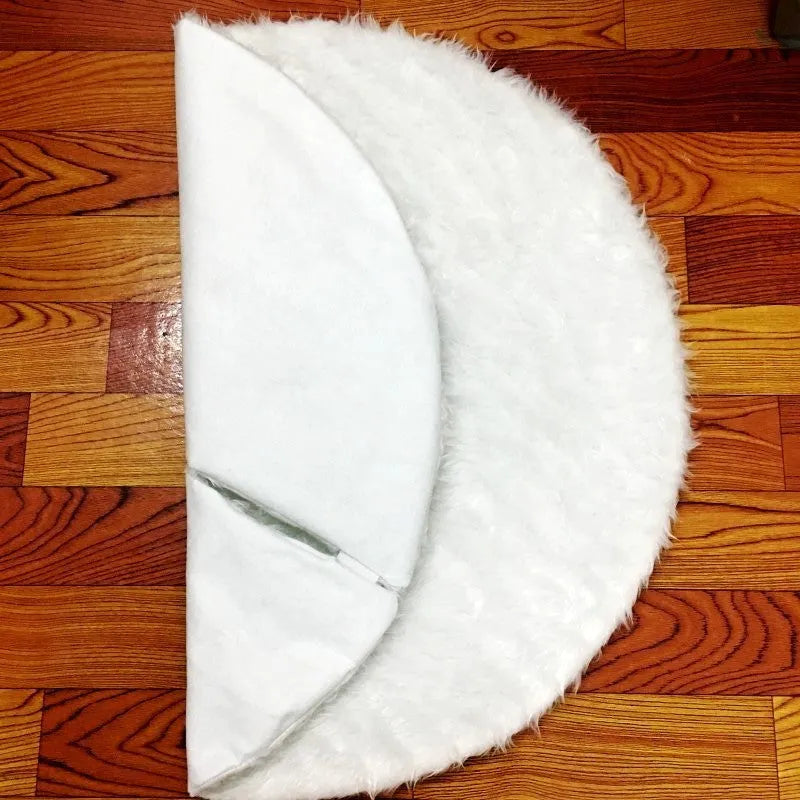 White plush Christmas tree skirt in 78cm, 90cm, 122cm or 150cm for covering a Christmas tree base and protecting the floor from pine needles.
