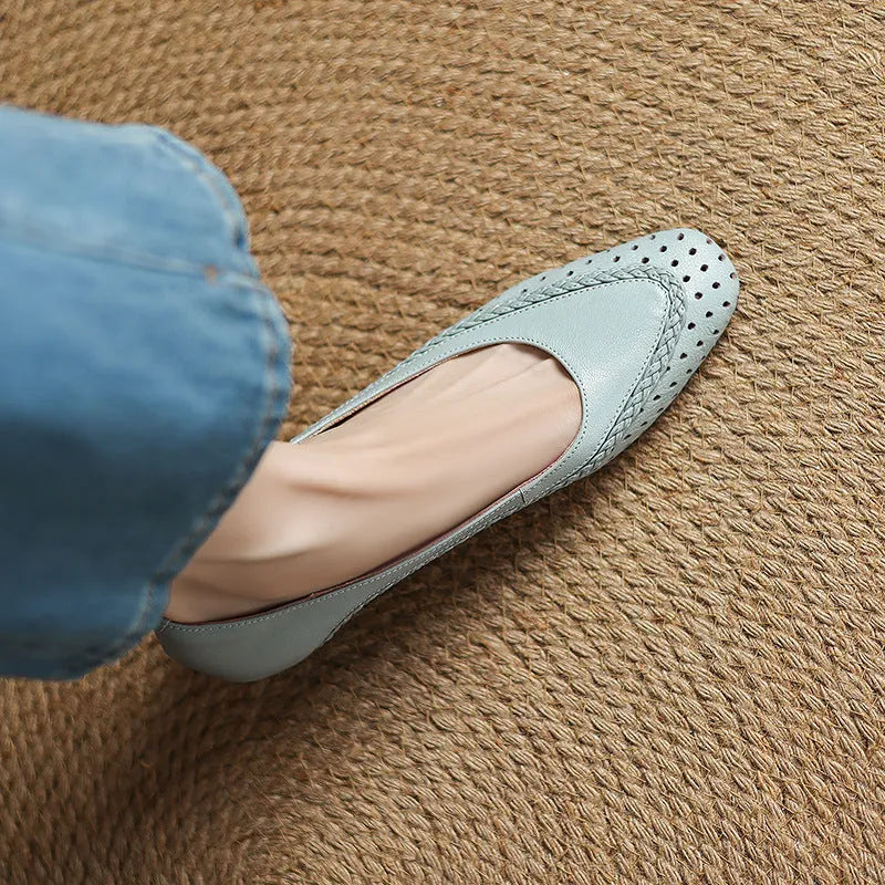 Women's milky white goat skin sandals with hollow-out design and beef tendon sole.