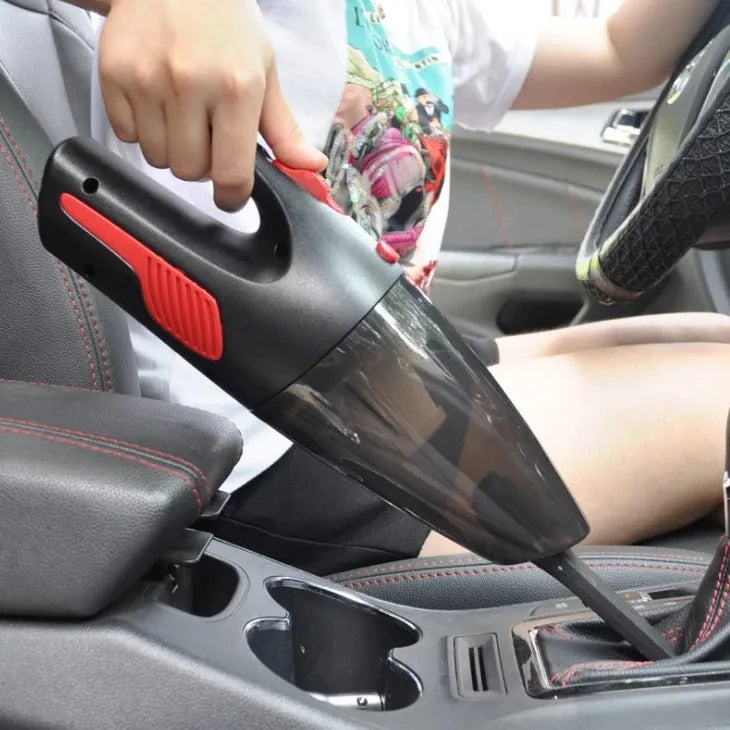 Handheld 120W car vacuum cleaner with brush and nozzles on car seat