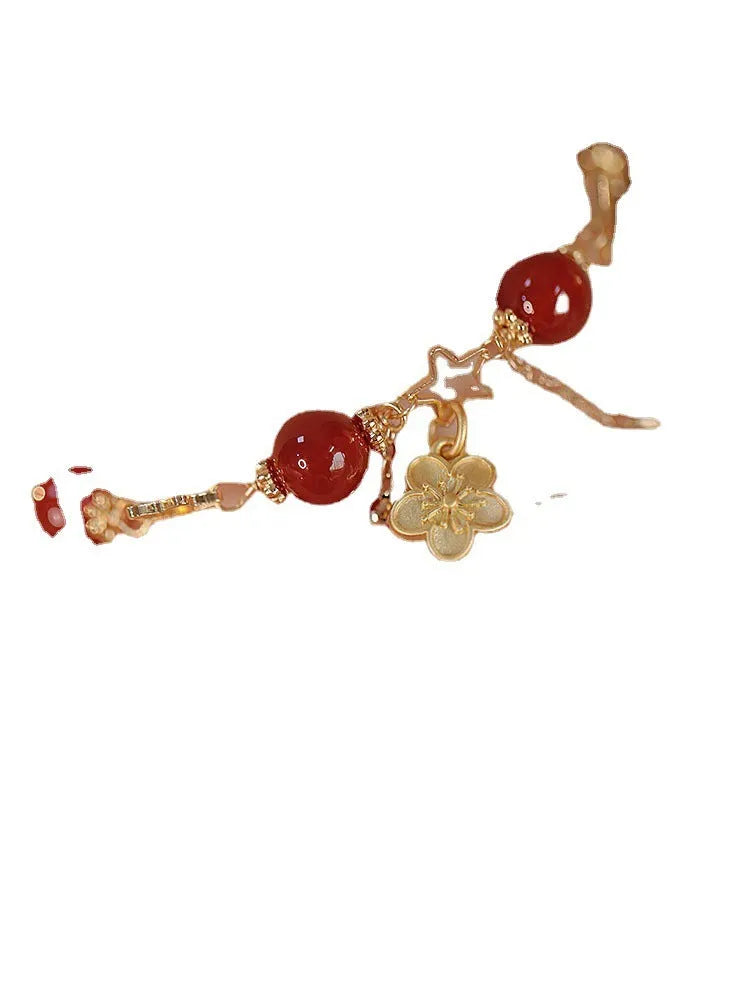 Women's red agate bracelet with double layer design and floral charms