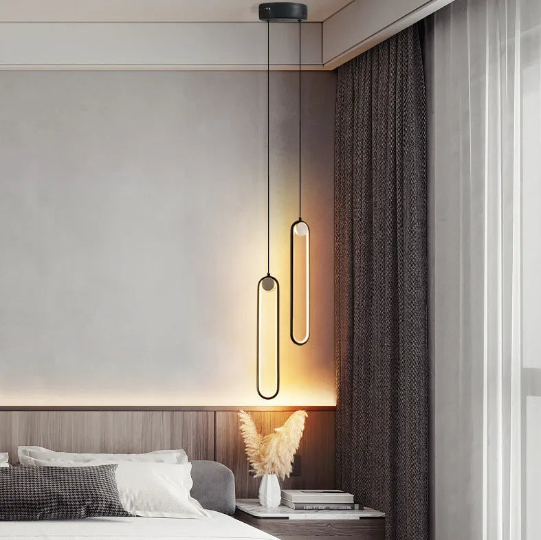 Nordic minimalist oval bedside chandelier in Black A finish showing LED tri-colour ceiling light with aluminium alloy body