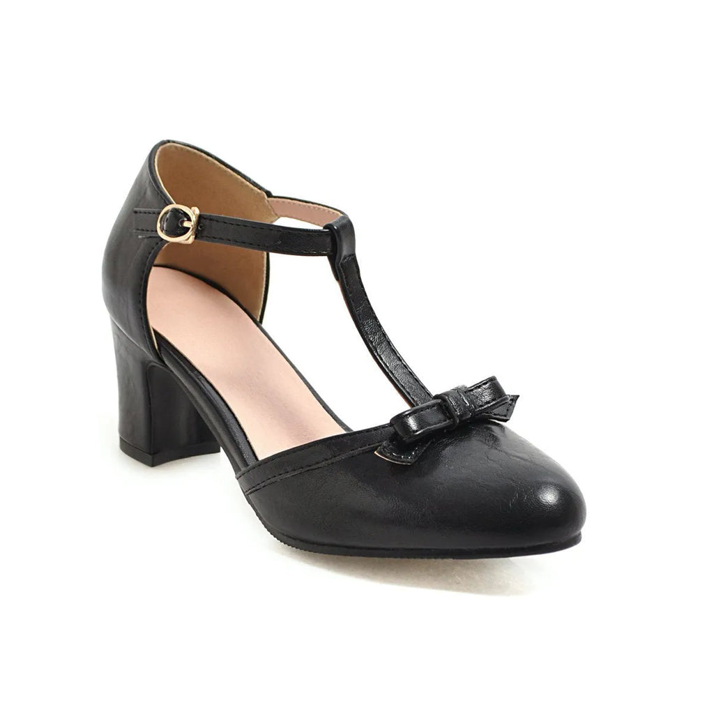 Women's platform sandals with chunky 6.5cm heel, hollow-out pattern and decorative bow detail