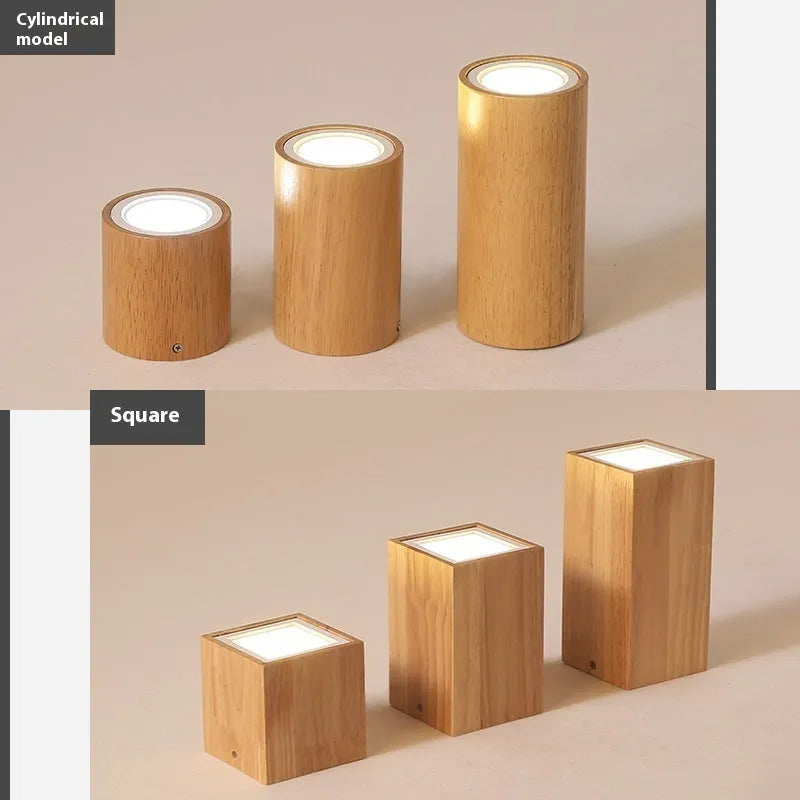 Modern solid wood surface mounted downlight in wood colour, shown in round and square shapes.
