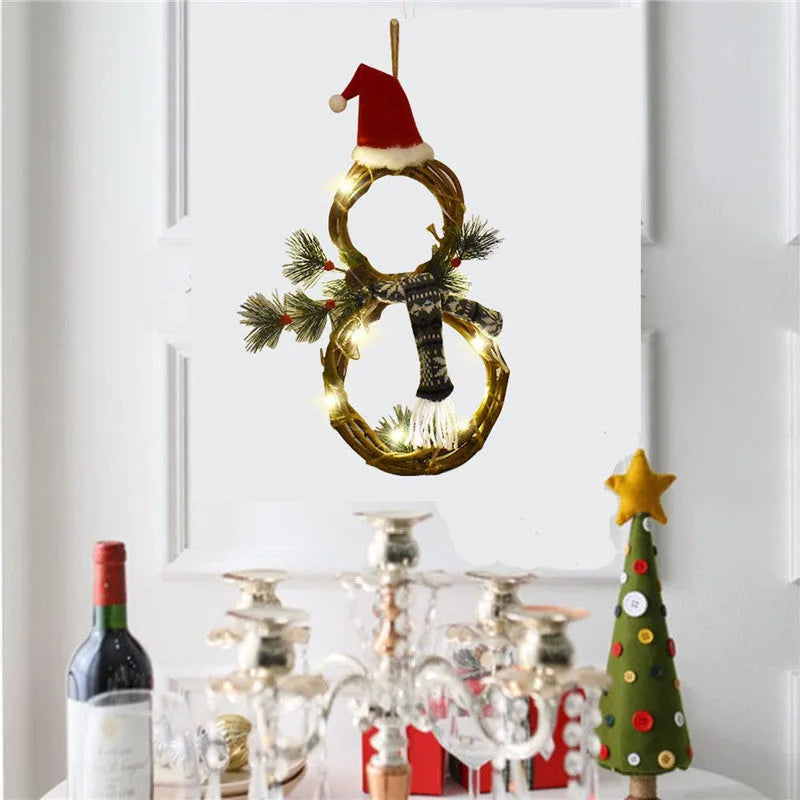 Christmas wreath made of pine needles on a vine circle base in red and grey colours for door decoration