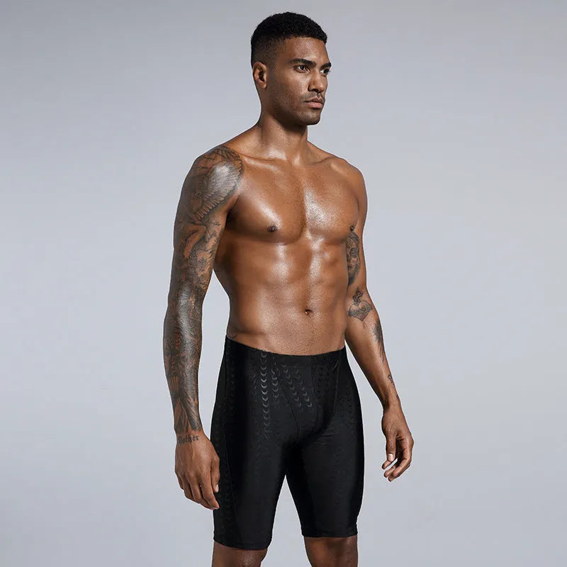 Men's solid colour polyester swimming trunks shown in boxers and cropped pants styles.