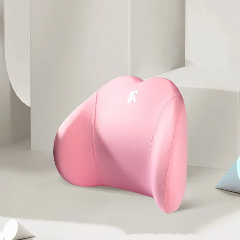 Heart-shaped car pillow in choice of colours, shown as headrest and lumbar support on a car seat.