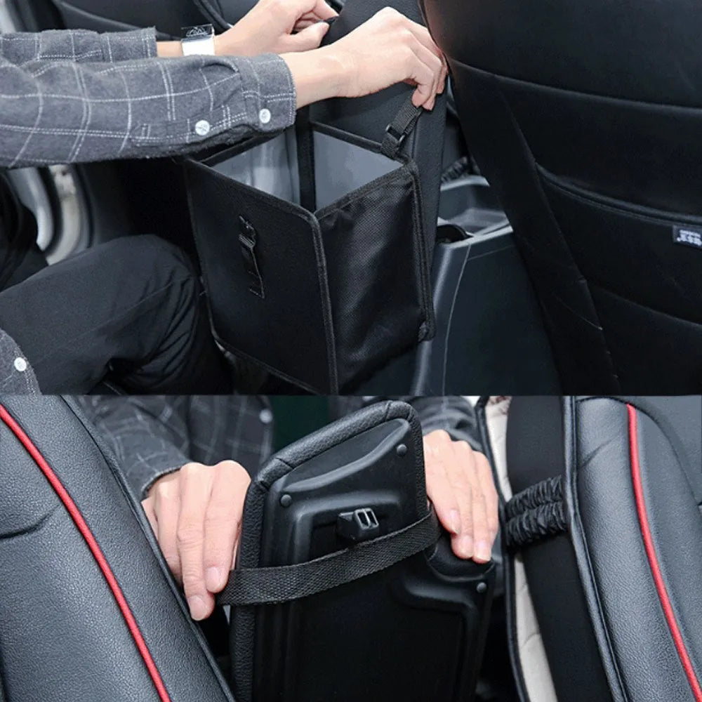 Foldable black Oxford car wastebasket with adjustable strap held on red seat headrest