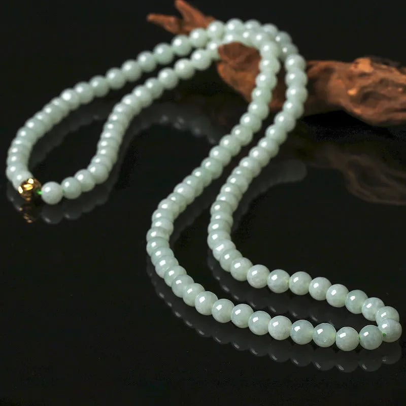 Natural jade bead necklace with white and green round beads on adjustable chain