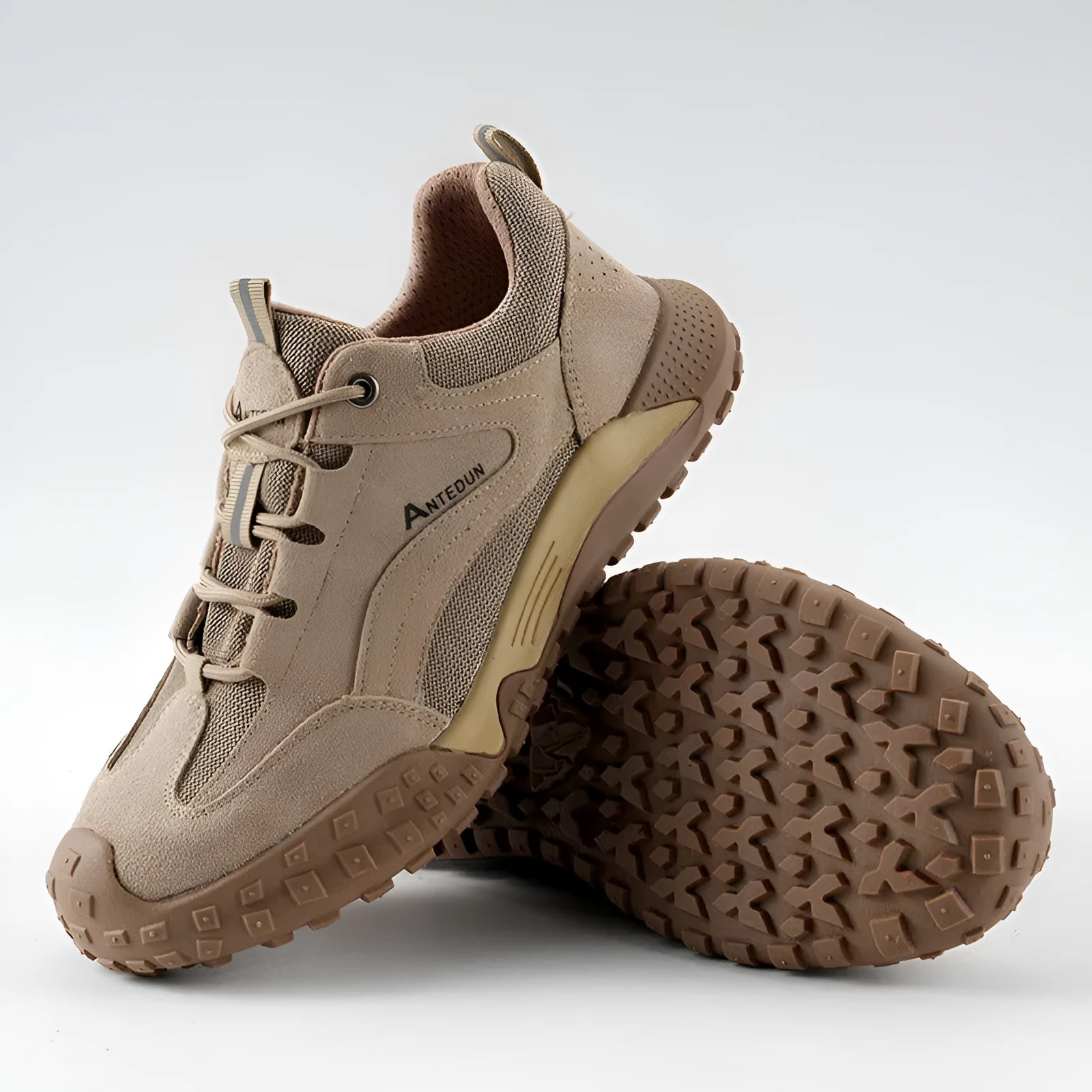 Men's khaki suede and canvas low-top safety shoes with lace-up closure and plastic steel toe for construction site use