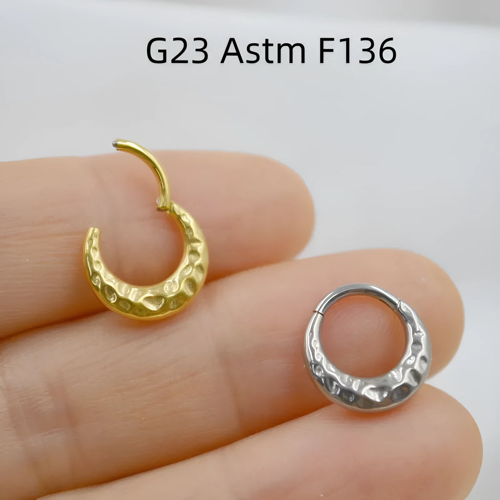 Titanium alloy concave-convex nose ring with carved surface in gold or silver colour, showing 1.2x8mm and 1.2x10mm size options