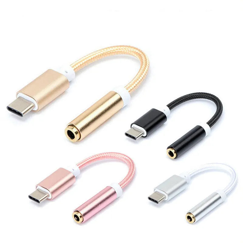 Short black nylon-braided Type-C to 3.5mm female audio adapter cable on a white background.
