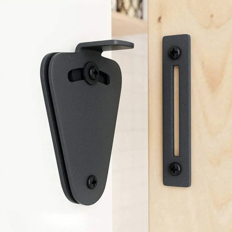 Black stainless steel sliding barn door lock showing two size options for different door gap measurements