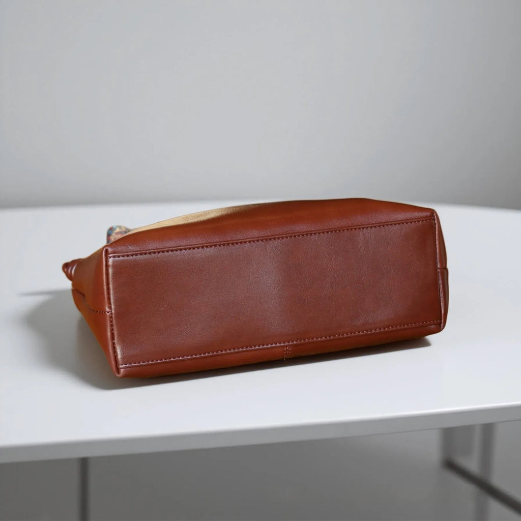 Genuine leather creative large capacity pillow-shaped shoulder bag in black with double straps and top grain leather finish