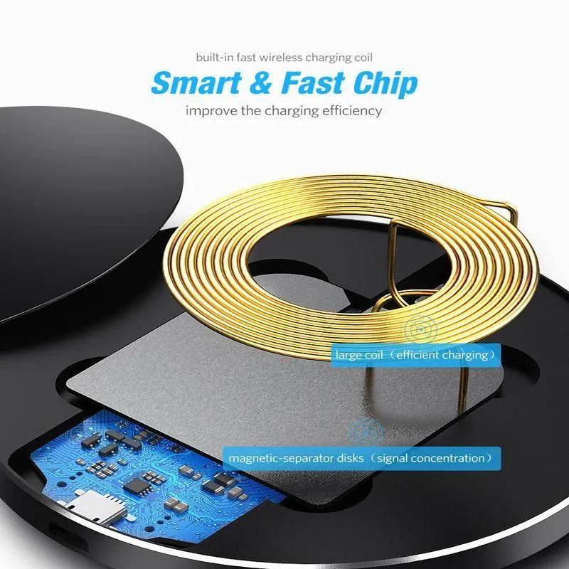 Black ultra-thin square wireless charging pad with USB cable on a desk.