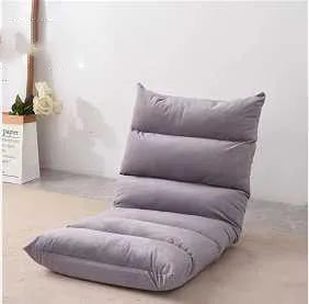 Beige lazy sofa floor chair with adjustable backrest on living room floor showing six-angle mechanism