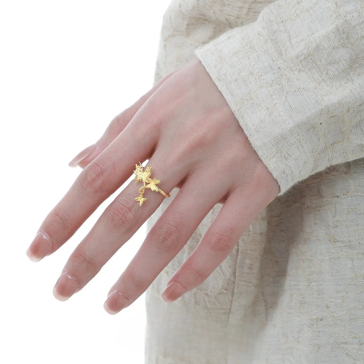 Adjustable silver ring featuring a wild butterfly design, shown in a choice of electroplated finishes.