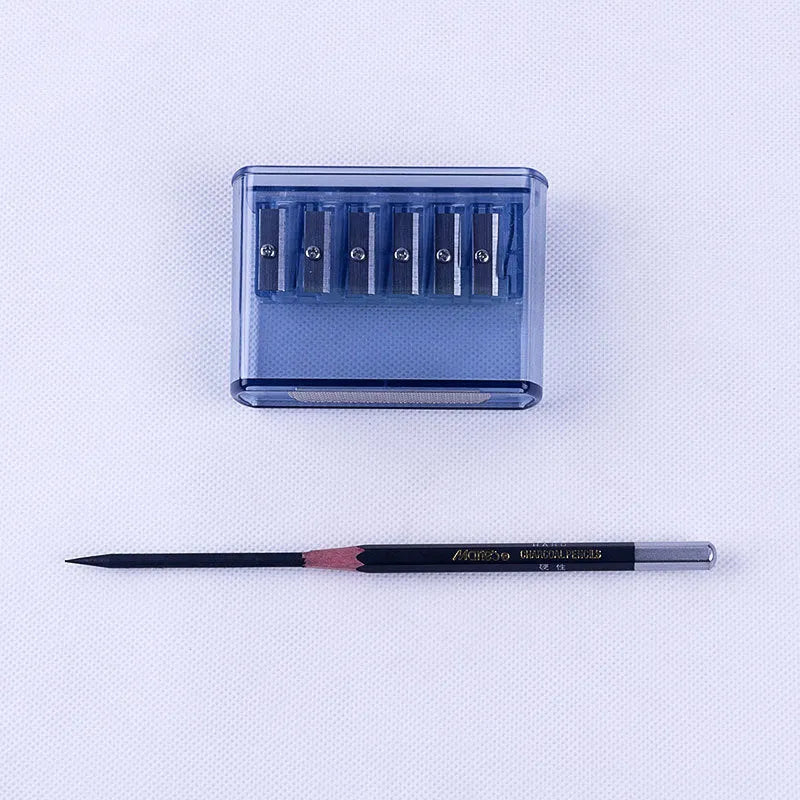 LK06 manual six-hole pencil sharpener made of white ABS plastic with a replaceable blade.