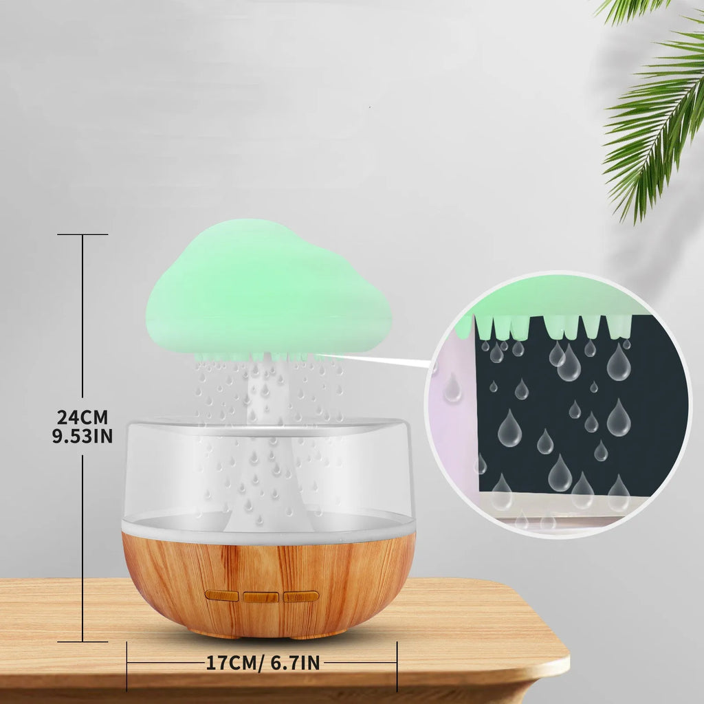 White cloud-shaped aromatherapy humidifier with night lights and USB cable.
