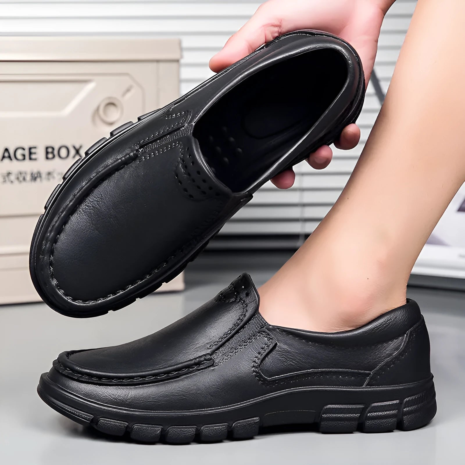 Men's black mid-top slip-on work shoes with platform sole, artificial leather upper, and round toe