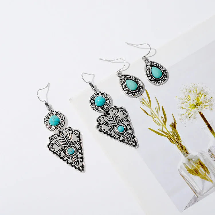 Alloy retro drop earrings in triangle and water drop shapes for women's holiday travel style