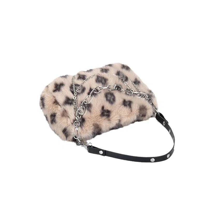 Plush luxury-style chain bag in apricot with leopard print and gold-tone chain, horizontal rectangular shape, soft texture.