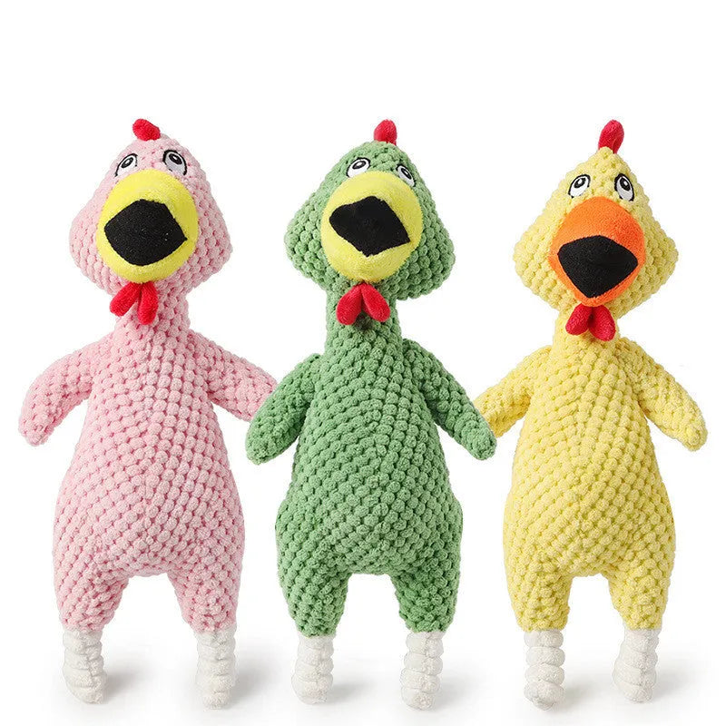 Pink pineapple velvet squeaky pet toy shaped like a chicken, 35cm long, on a white background