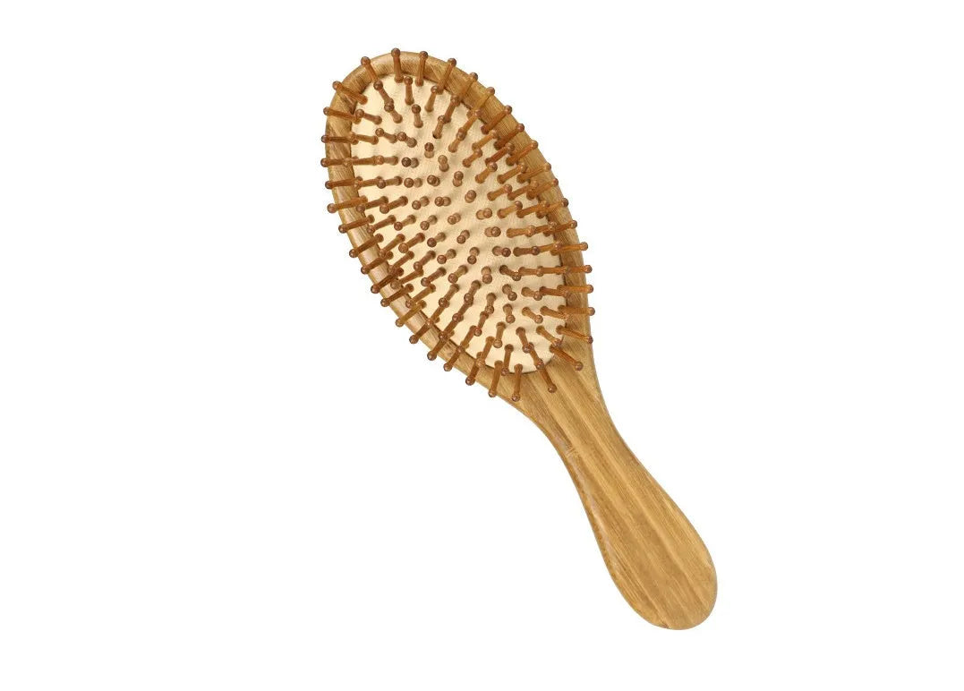 Carbonized bamboo massage comb 66x218mm on a neutral background, showing natural wood texture and teeth